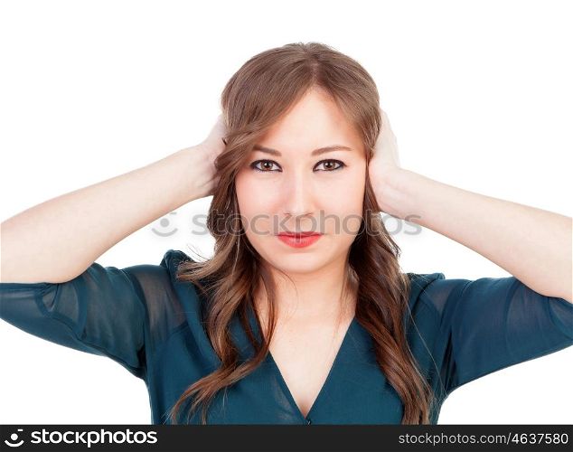 Sad young woman covering her ears isolated on a white background