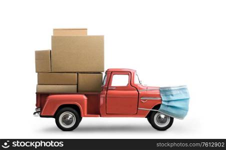 Safe delivery. Car in mask delivering blank boxes. Loaded pickup truck with protection isolated on white background.. Safe order delivery