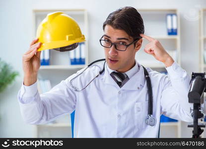 Safety doctor advising about wearing hard hat