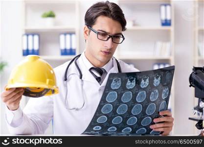 Safety doctor advising about wearing hard hat