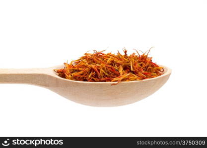 saffron spice in wooden spoon isolation white background