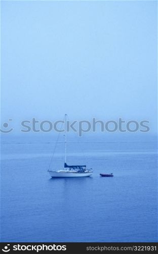 Sail Boat Moored in Ocean