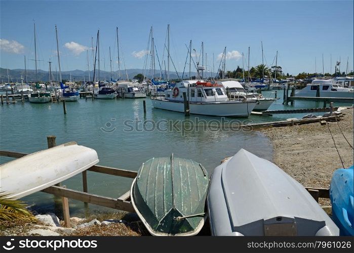 Sail boats rest at their moorings at the Motueka Yacht club in New Zealand