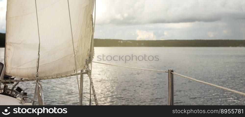 sail of a yacht sailing on the lake.. sail of a yacht sailing on the lake