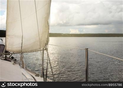 sail of a yacht sailing on the lake.. sail of a yacht sailing on the lake