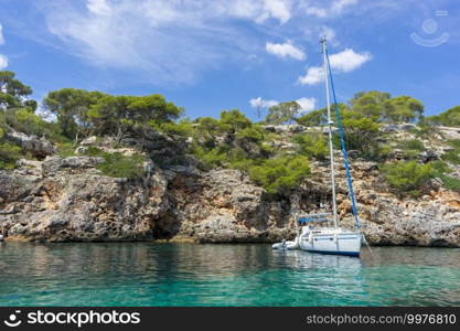 sailboat anchored on the beach, mallorca