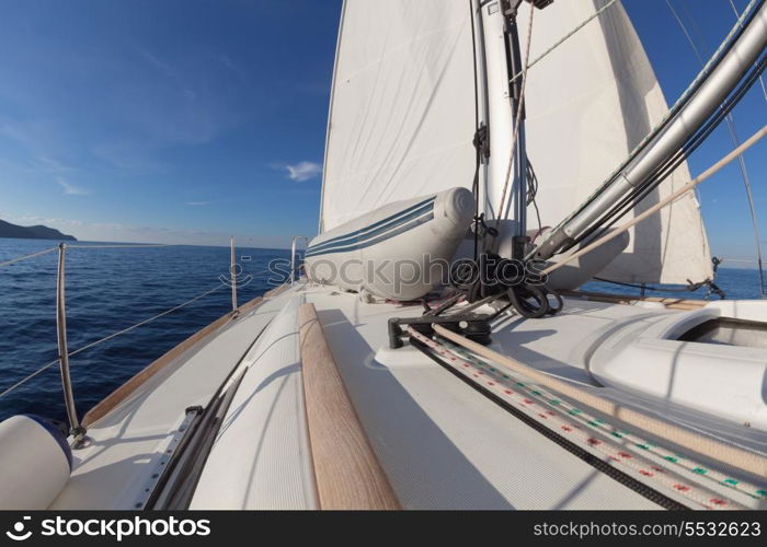 Sailboat crop during the regatta at sunset ocean&#xA;