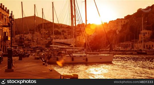 Sailboat harbor in sunset light, yacht port in old greek town, beautiful landscape, summer adventure, luxury water transport&#xA;