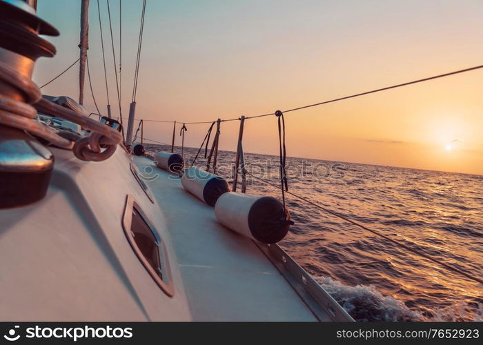 Sailboat on Sunset. Romantic Sailing in Mediterranean Sea. Luxury Summer Vacation. Active Lifestyle.