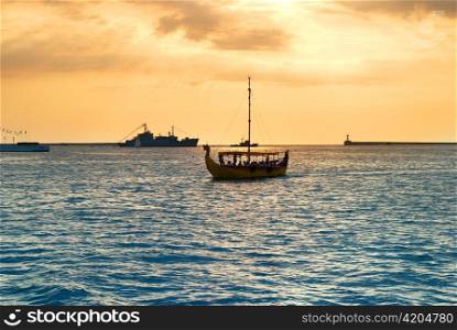Sailboat on the sea against beautiful sunset