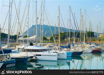 Sailboats in famous Port Vell marina in Barcelona, Spain