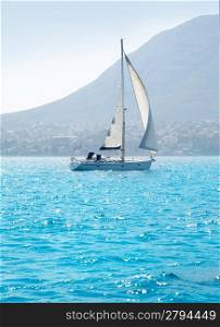 sailboats sailing in mediterranean sea on Denia Alicante