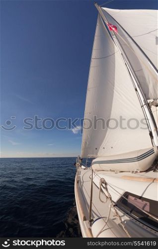 Sailing boat crop in the sea