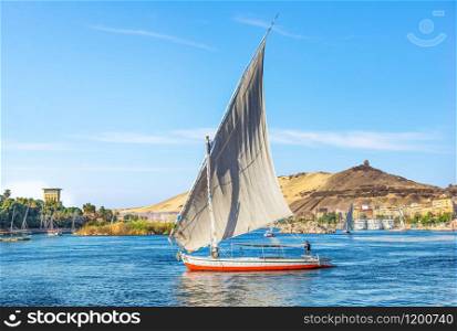 Sailing boat in Aswan on river Nile at sunny day. Sailing boat in Aswan