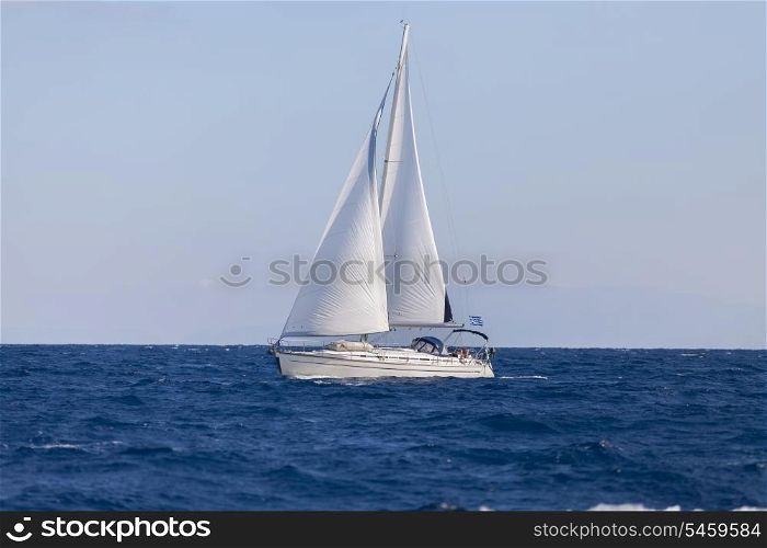 Sailing boat in open blue sea&#xA;