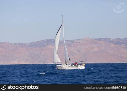 Sailing boat in open blue sea&#xA;