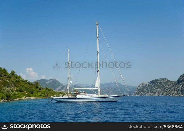 Sailing boat in the bay of island in Aegean Sea