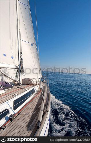 Sailing boat in the middle of the sea