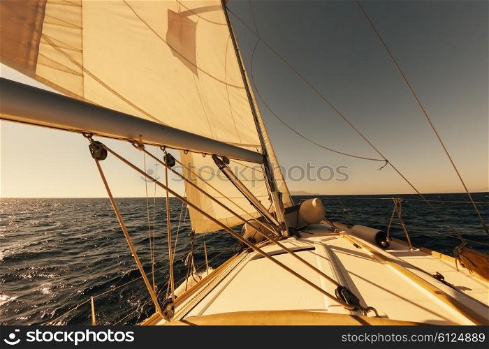 Sailing boat wide angle view in the sea at sunset, instagram toning&#xA;