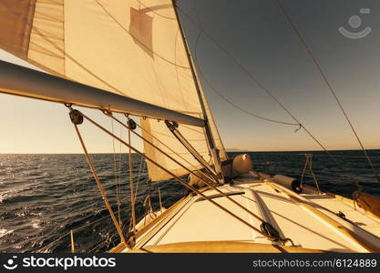 Sailing boat wide angle view in the sea at sunset, instagram toning&#xA;