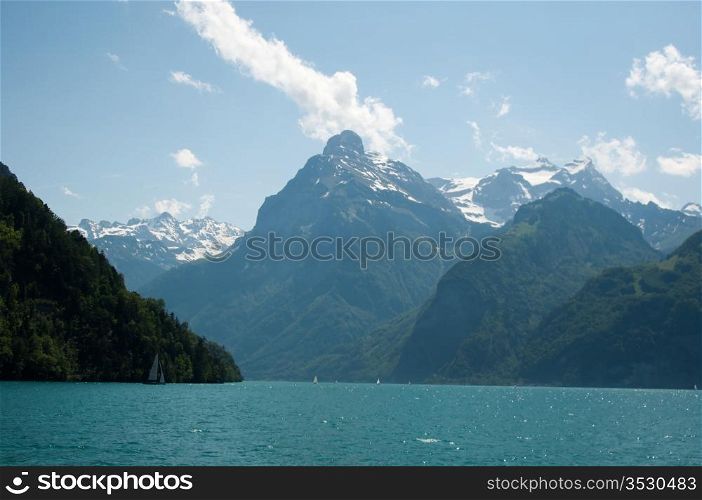 Sailing Boats and beautiful mountain panorama at Lake Lucerne, Switzerland