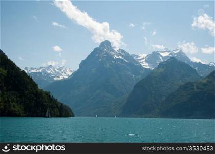 Sailing Boats and beautiful mountain panorama at Lake Lucerne, Switzerland