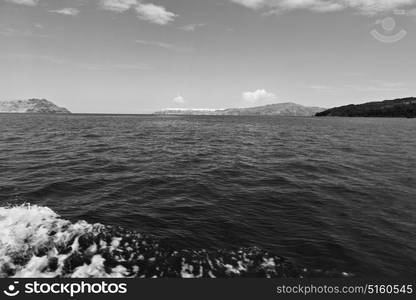 sailing in europe greece santorini island hill and rocks on the summertime beach