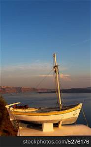 sailing in europe greece santorini island hill and rocks on the summertime beach sunset boat