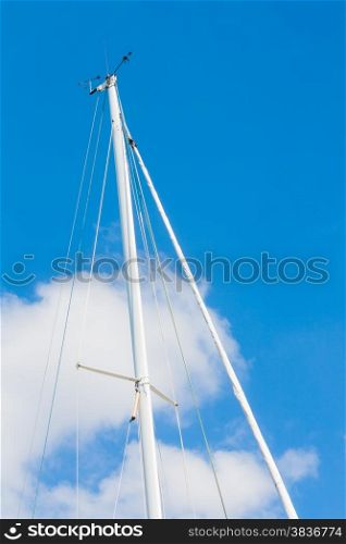 Sailing Must and Blue Sky, Particular of sailing must in a touristic harbor