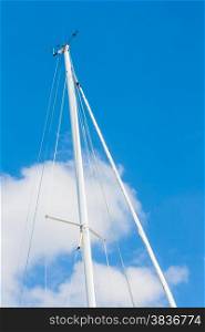 Sailing Must and Blue Sky, Particular of sailing must in a touristic harbor
