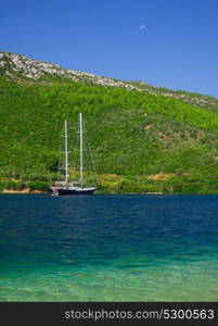 Sailing ship in the blue sea