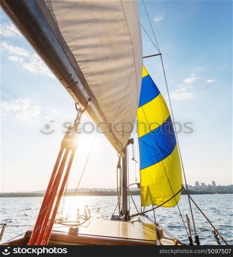 Sailing yacht on big river