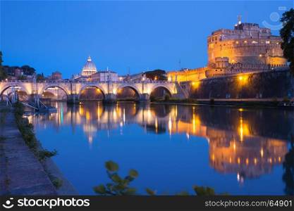 Saint Angel castle and bridge, Rome, Italy. Saint Angel castle and bridge with mirror reflection in Tiber River during morning blue hour in Rome, Italy.