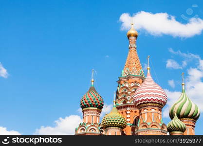 Saint Basil cathedral on Red Square in Moscow and blue sky with white clouds in sunny summer day