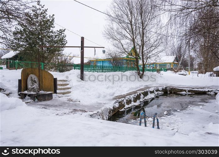 Saint Bogoroditsyn spring on a winter day in the village of Vyatskoye, Yaroslavl Region, Russia.