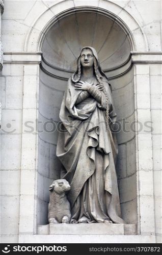 Saint Genevieve at the facade of the Saint Etienne du Mont Church, Paris.