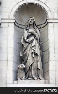 Saint Genevieve at the facade of the Saint Etienne du Mont Church, Paris.