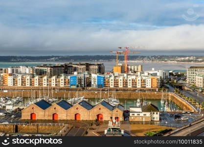 Saint Helier capital city panorama with port and marina in the foreground, bailiwick of Jersey, Channel Islands