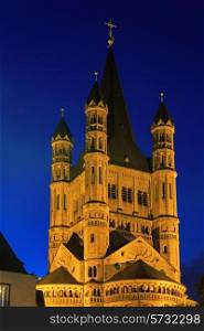 Saint Martin church in Cologne with illumination at night, Germany&#xA;
