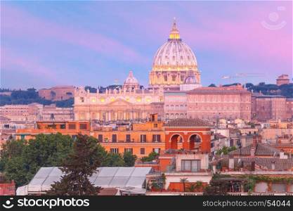 Saint Peter Cathedral at sunset in Rome, Italy.. The view from the Pincian Hill overlooking St. Peter Basilica during beautiful sunset in Rome, Italy.