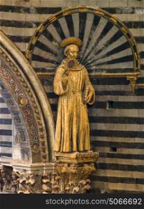 Saint statue at Siena Cathedral, Siena, Tuscany, Italy