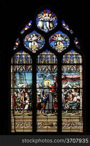 Saint Vincent de Paul gathering with the Daughters of Charity abandoned children, stained glass, Saint Severin church, Paris, France