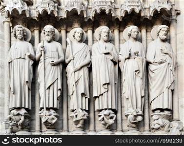Saints on fasade of The Notre Dame de Paris. France.