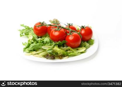 salad and cherry tomatoes isolated on white background