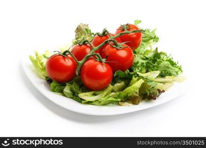 salad and cherry tomatoes isolated on white background