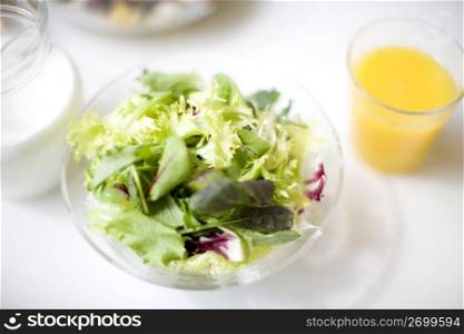 Salad and orange juice