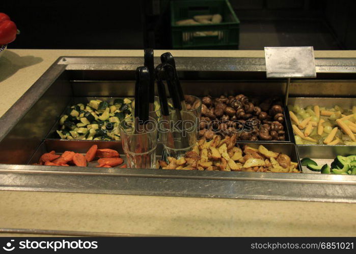 Salad buffet, self service counter at a restaurant