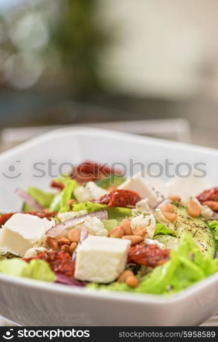 Salad feta cheese. Salad feta cheese lettuce sausage cucumbers and pine nuts