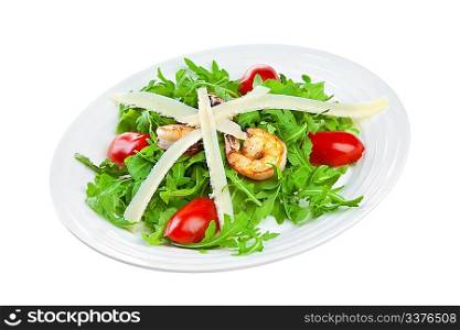 Salad from eruca and shrimps a white background
