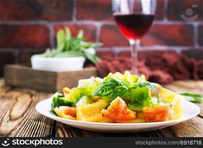 salad from fresh tomato on the plate